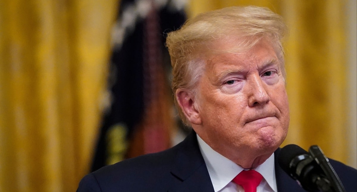 DineshDSouza's tweet card. This is a developing story.