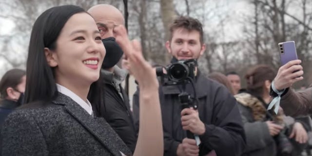 ELLEmagazine's tweet card. The K-pop singer and brand ambassador shares her experience seeing the new collection during Paris Fashion Week.