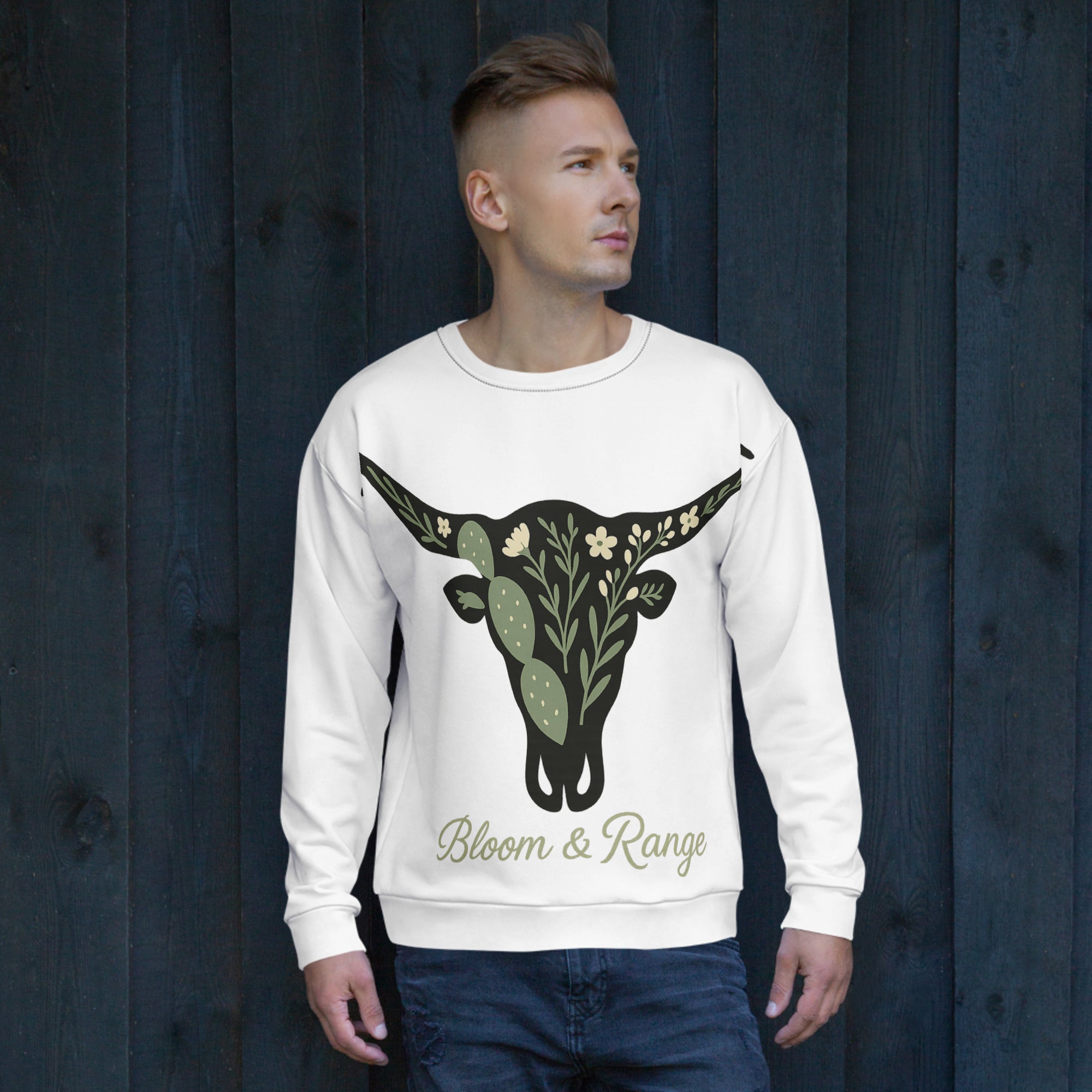 designdelight25's tweet card. Embrace the frontier spirit with botanical flair in our 'Bloom & Range' sweatshirt. Showcasing a floral longhorn skull design, this all-over print is made from 96% GRS-certified recycled polyester...