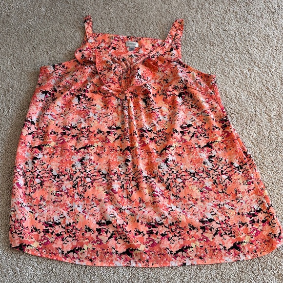 cocoabay2's tweet card. Chic sleeveless top with a vibrant floral pattern. Bin 31