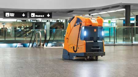 CleanLinkNews's tweet card. This article features topics on: pat manuel, jon hill, laserclean systems llc, janitorial industry, william dillon, diversey inc., robotic cleaning