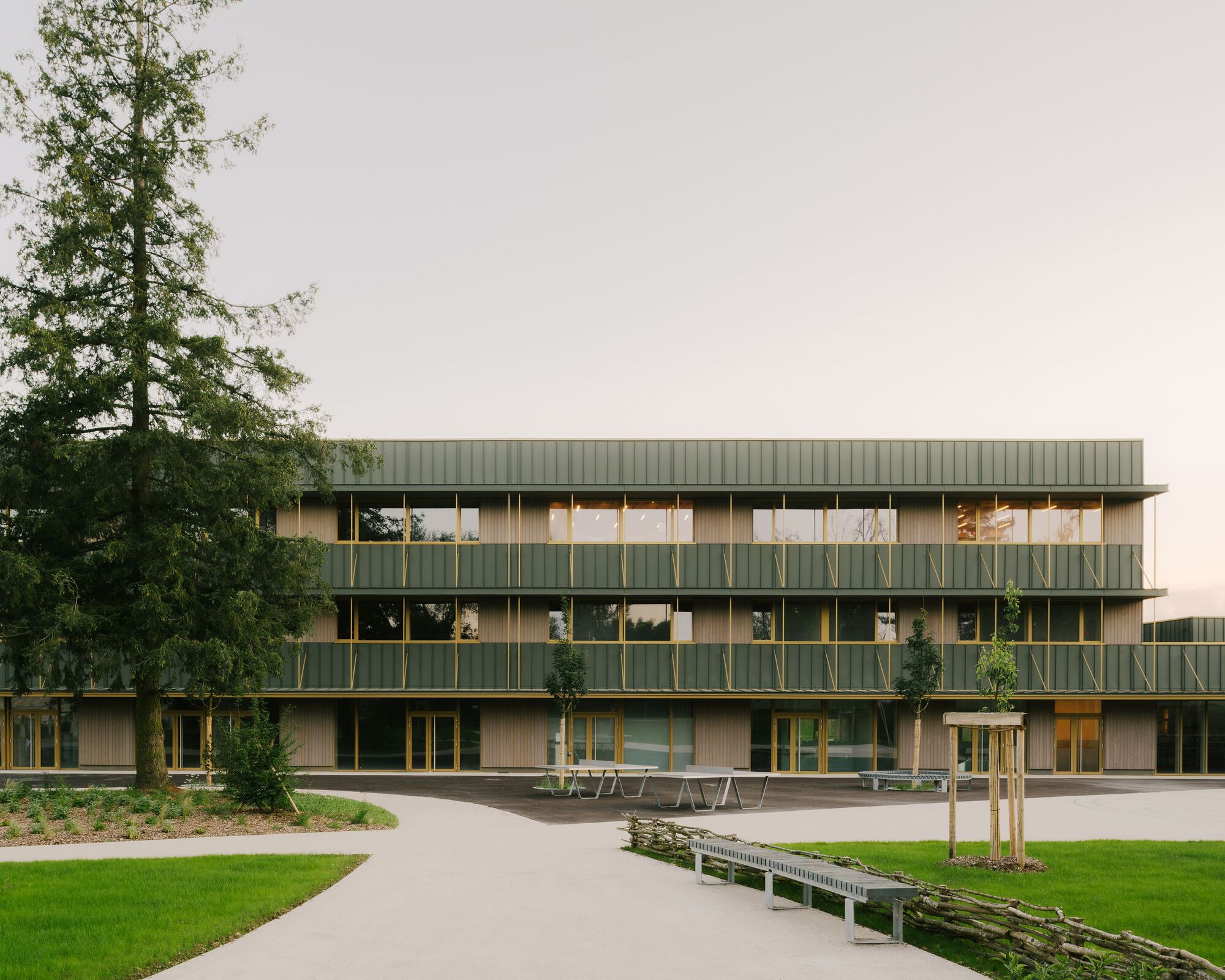 GandDhomes's tweet card. Bricks so bright, they spark insight—#campusdesign done right. #formandfunction