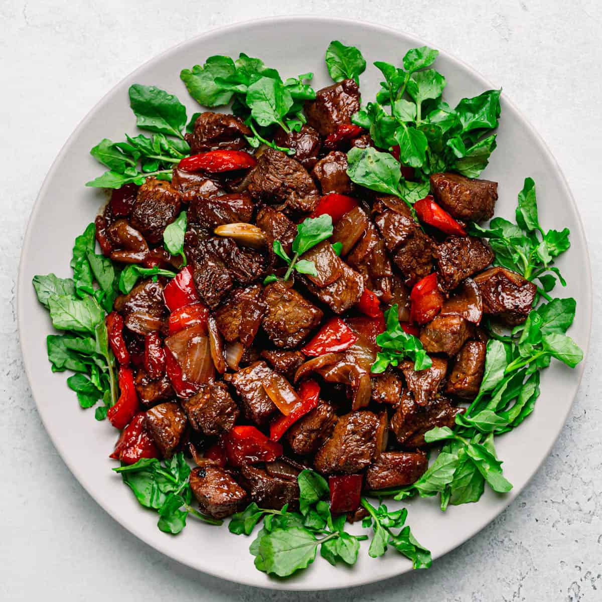 PoshJournalBlog's tweet card. A tasty Bo Luc Lac - Vietnamese Shaking Beef recipe. It's loaded with sweet and savory flavors, yet, it's so easy to make.