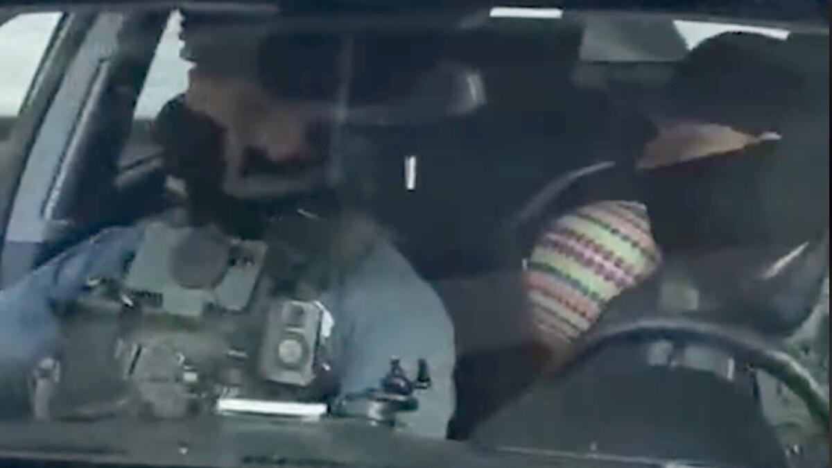 brittny_mejia's tweet card. Federal immigration agents detained a man in Cypress Park whose toddler was strapped into the back seat of his vehicle. Two agents toting weapons climbed into his car and drove off, video showed.