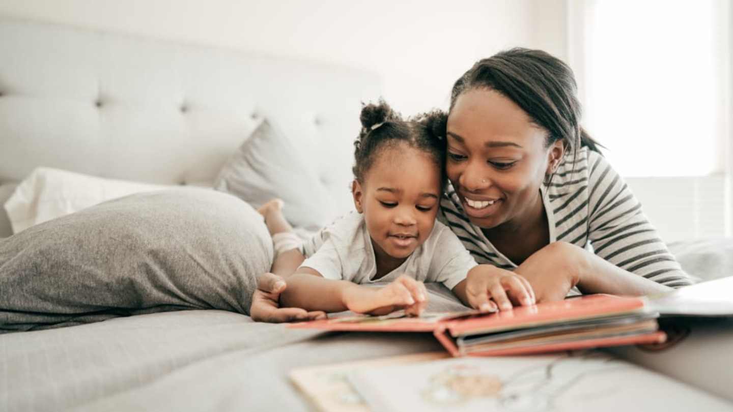 dimmick_library's tweet card. Reading out loud to kids from print books is more likely to promote positive interactions than reading from e-books, according to a new study.