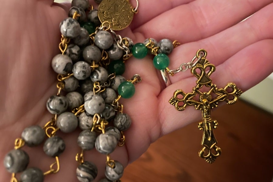 CatholicReview's tweet card. On a page, the words might seem like a repetitive series. But as with many spiritual practices, the Rosary is what you make of it.