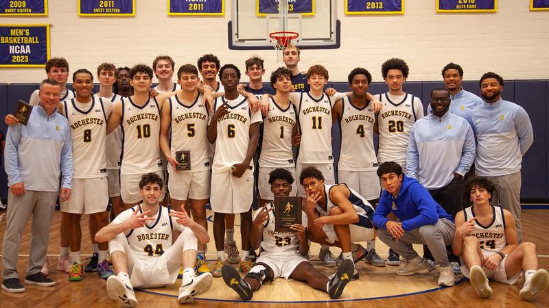 UofRathletics's tweet card. University of Rochester men's basketball blistered the nets, shooting 55.1 percent from the field and knocking down 17 three-pointers as they defeated the Utica University Pioneers, 103-80, on...