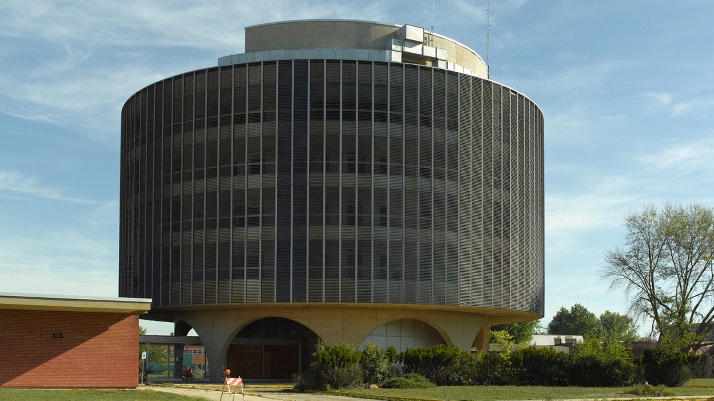 segment_im's tweet card. A circular healthcare facility designed by architect Bertrand Goldberg is at risk of demolition in Illinois after being closed for more than 20 years