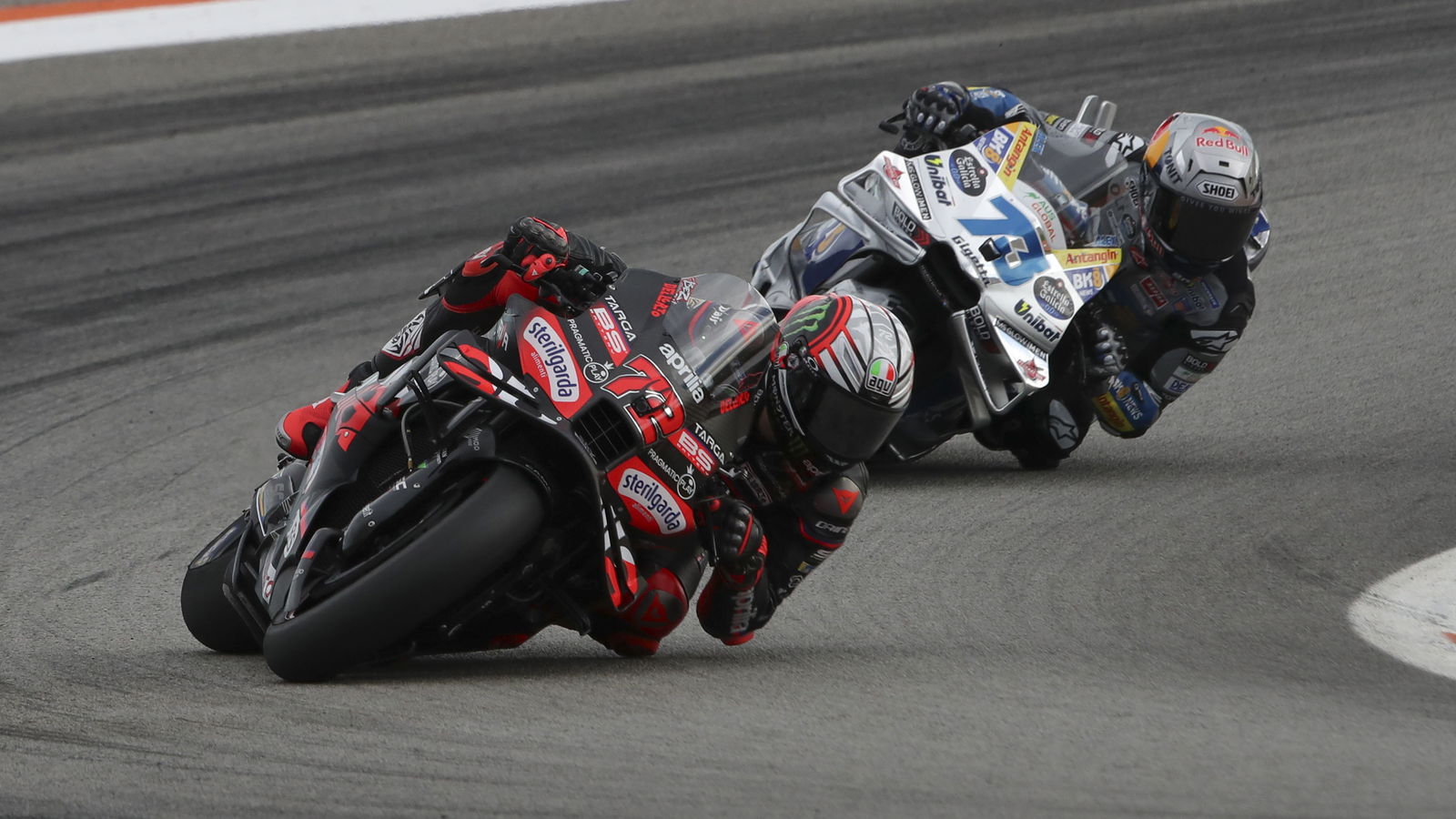 crash_motogp's tweet card. Marco Bezzecchi led an Aprilia 1-2 in the Valencia MotoGP finale