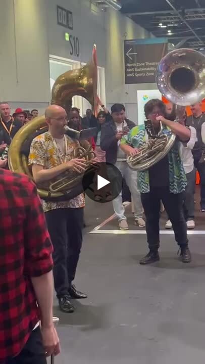 enablement_tech's tweet card. 🎺 🎺 A great finale to the Amazon Web Services (AWS) Summit! 🎺🎺 and the band was brilliant, but should vendors blow their own trumpets? 🧐 The AWS Startup Loft was the primary reason for my...