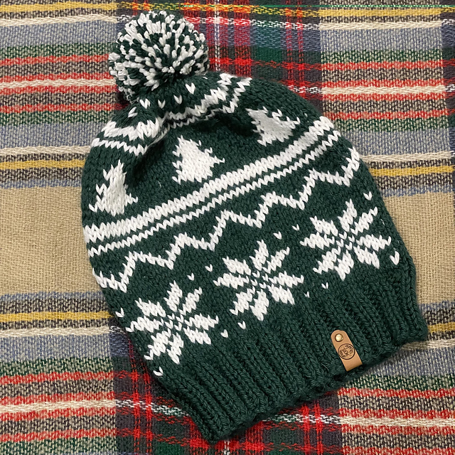 ChattaDesigner's tweet card. Currently there is only one size available for this hat, however, if you need a larger size, you can size up on the needle to increase your gauge a bit.