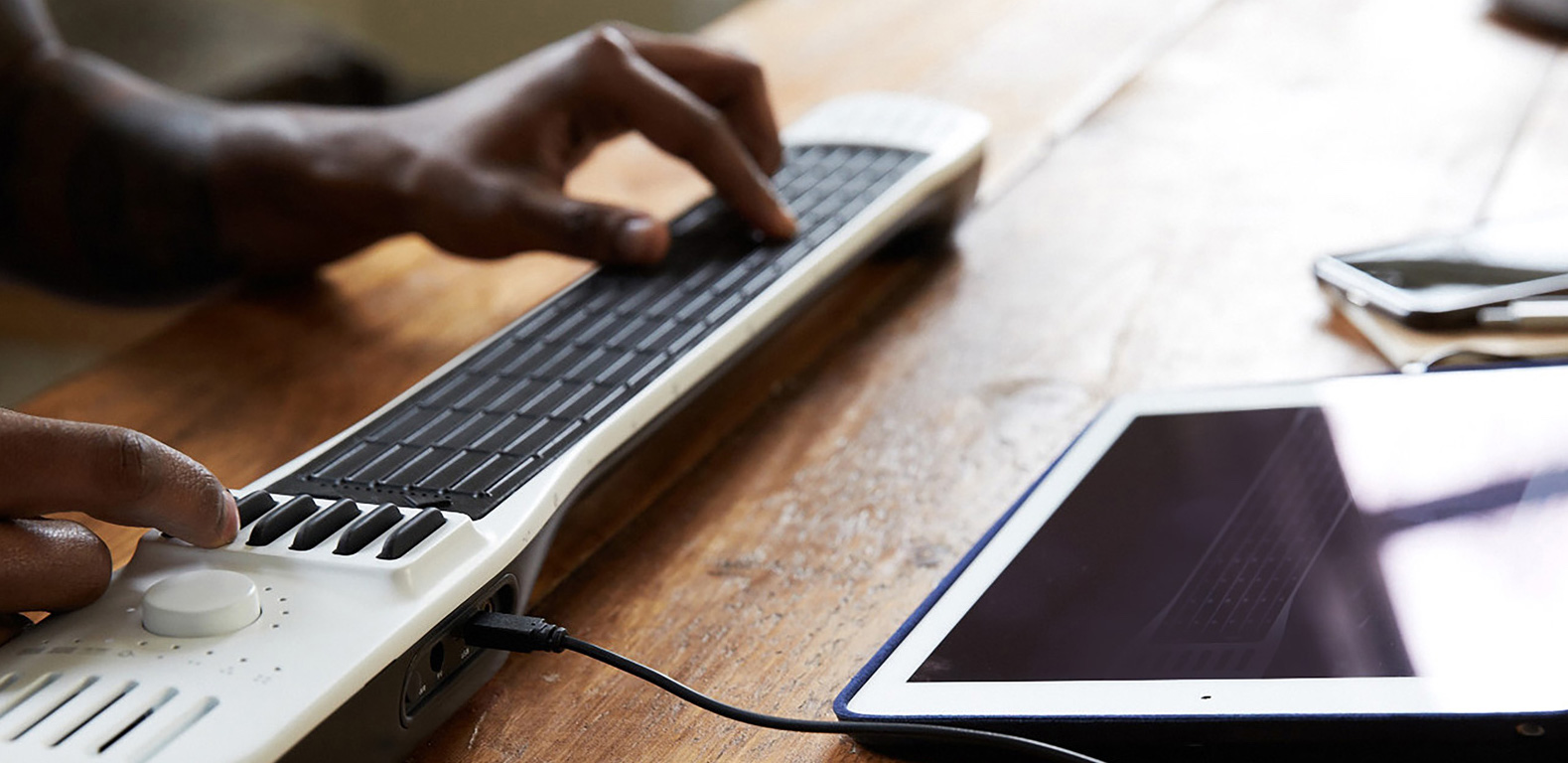 ProToolerBlog's tweet card. Take a Chapman Stick, add a lot of tech in its belly and jam a USB cable up its jacksie and you get something that looks vaguely like an INSTRUMENT 1. It's a completely new type of musical instrument...