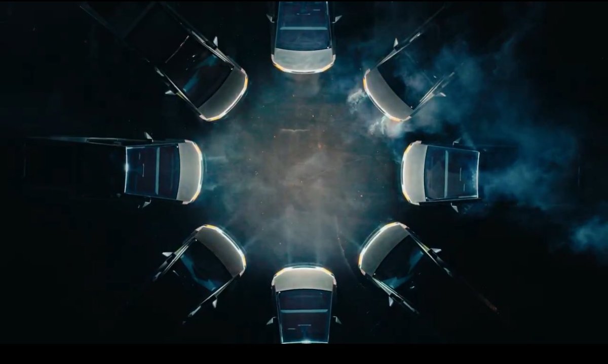 NotATeslaApp's tweet card. Tesla introduces Multi-Vehicle Coordinated Light Shows for the first time, easing Light Show design and coordination.