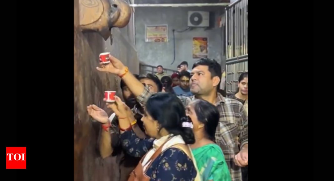 saurabhadeeb's tweet card. A viral video shows devotees at Banke Bihari temple in Vrindavan drinking air conditioner water, mistaking it for holy water. Health experts warn agai