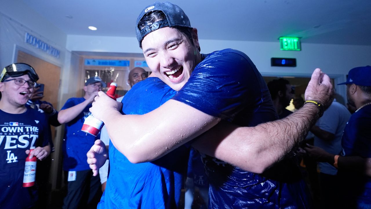 SpecNews1SoCal's tweet card. Dodgers clinch home field advantage