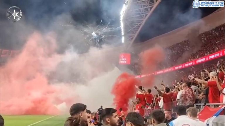 lowles_nick's tweet card. Police said dozens of smoke grenades and pyrotechnic devices were thrown, injuring 13 civilians and three police officers. But Hapoel Tel Aviv football club has claimed there was "brutal police...