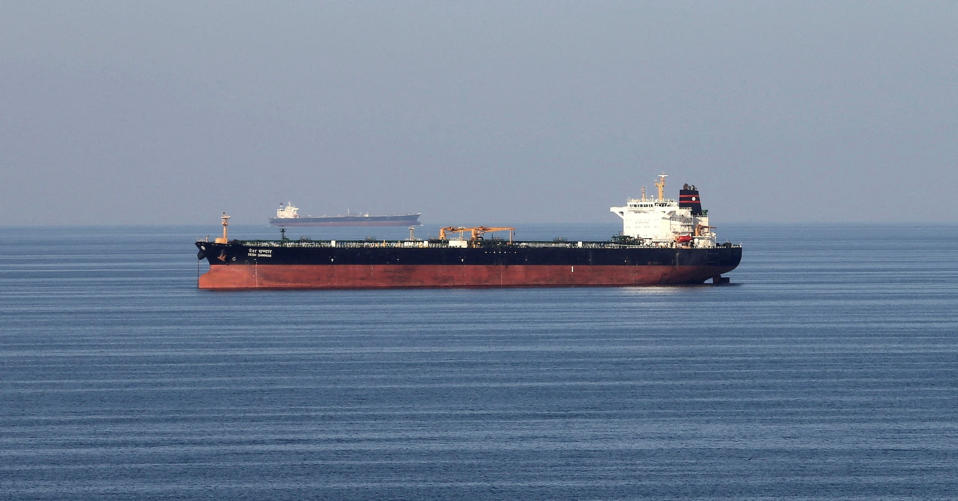 Reuters's tweet card. Former Iranian Economy Minister Ehsan Khandouzi has said that tankers and LNG cargoes should only transit the Strait of Hormuz with Iranian permission and this policy should be carried out from...