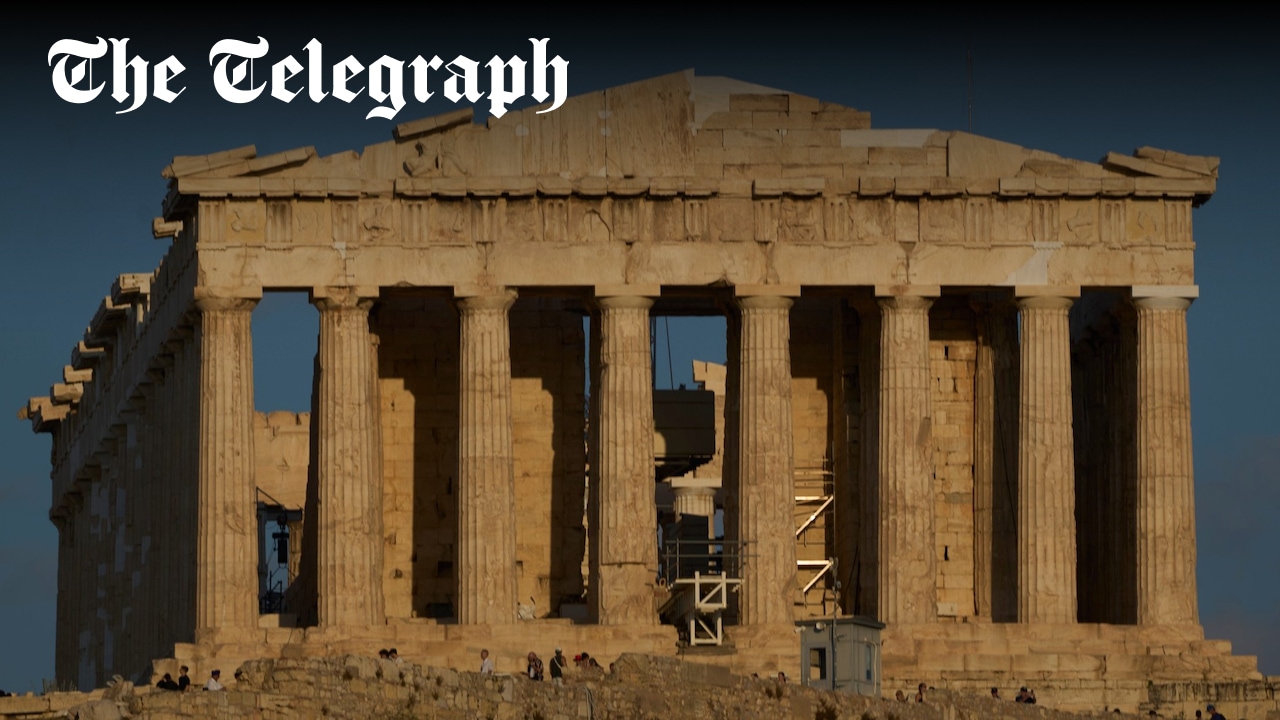 Telegraph's tweet card. Tourists have unobstructed views of stone temple on top of the Acropolis after restoration structures are removed
