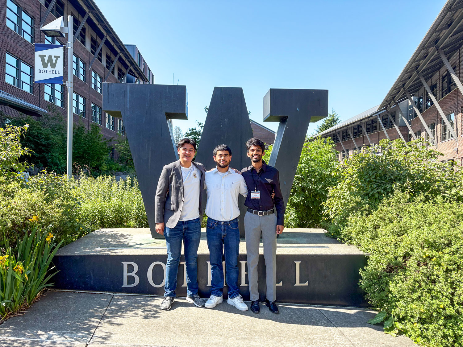 UWBothell's tweet card. Through a recent hackathon project, three students aim to reduce AI’s climate impact while pursuing green careers in tech. 