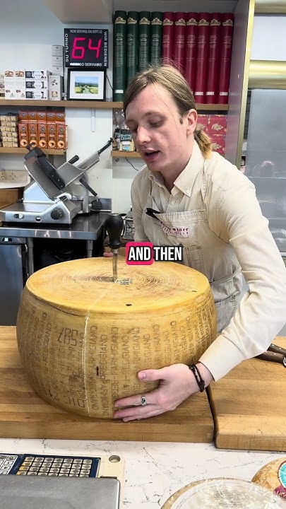 taruphologica's tweet card. Let's cut some cheese #cheese #parmigianoreggiano #cheesemonger