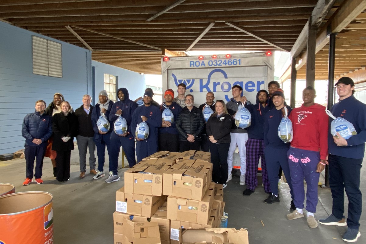 ESlibeck's tweet card. CHARLOTTESVILLE, VA (CVILLE RIGHT NOW) - Some 20 members of the University of Virginia football team showed up at the Blue Ridge Area Food Bank Harris Street distribution center for Kroger's donation...
