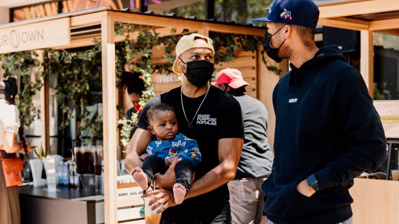 BasicBlackGBH's tweet card. A Carson native is encouraging men to join him