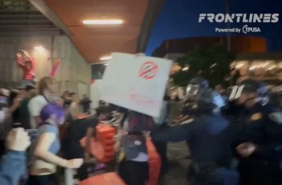 MPHProject's tweet card. Protesters tried to storm the barriers.