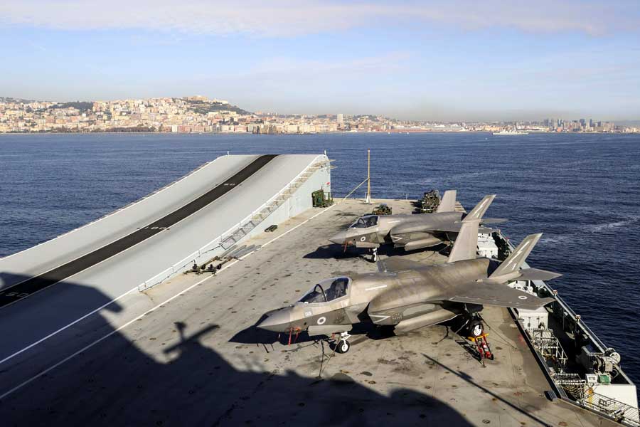 JointForcesNews's tweet card. The Royal Navy’s powerful aircraft carrier HMS Prince of Wales and her advanced F-35 fighter jets are under NATO command,