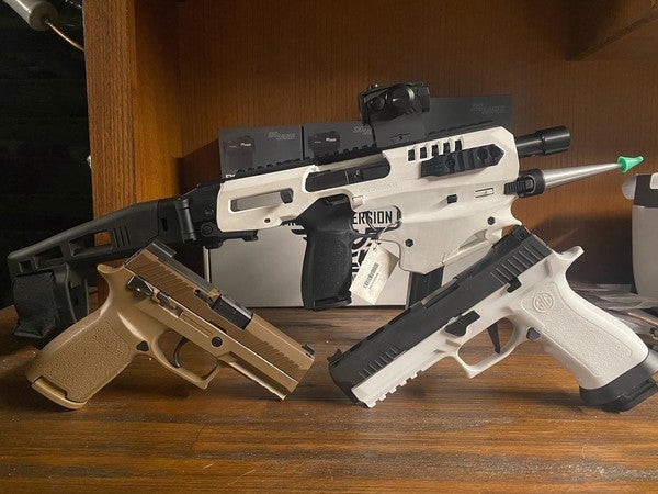 ModarMan's tweet card. Anyone have any 9? Asking for a friend🥴 #caagearup #sigsauer #p320 #xfivelegion #m18 #rangedayfriday