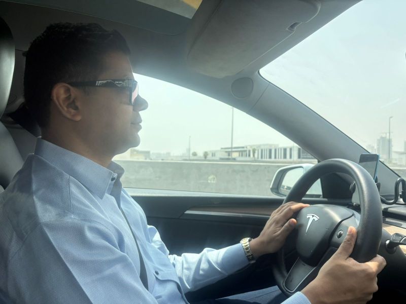 ankitjain_201's tweet card. This picture of me driving a #Tesla comes with a twist— the car wasn’t mine. It belonged to a cab #driver during one of my overseas trips. On the ride, I noticed he was constantly doing the opposite...