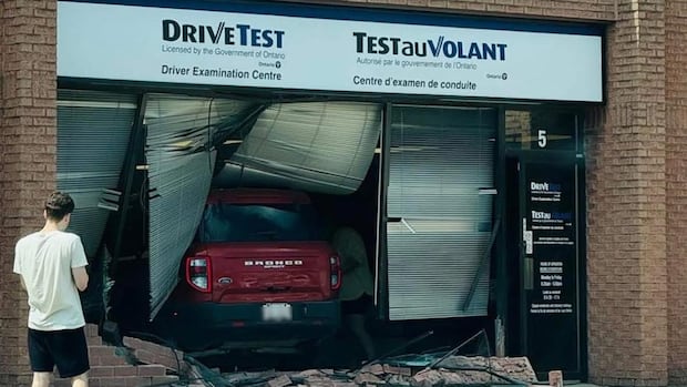 Drive_Better's tweet card. It was the crash that launched a thousand quips — and yes, it really happened. A driver collided with a driver examination centre in southwestern Ontario.