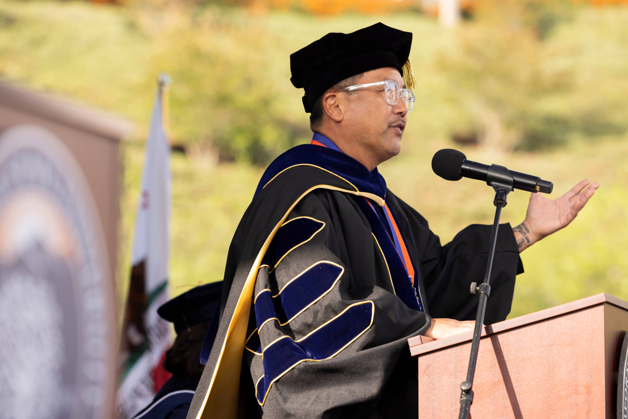 csuf's tweet card. Restaurateur Roy Choi was awarded an honorary doctor of fine arts degree at Cal State Fullerton’s College of Business and Economics commencement ceremony.