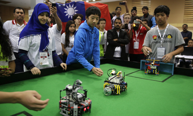 cogmation's tweet card. The two breadbox-sized scooters, playing goalie and kicker, from the team called 'Wings of Storm' were up against another Taiwanese team's robots in the 'Football' category of the World Robot...