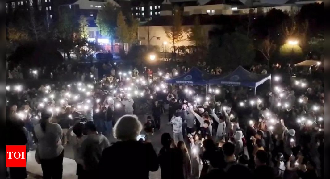 abhishek_kshah's tweet card. China News: Beijing, Shanghai, Urumqi, Nanjing, Guangzhou, Wuhan and at least a dozen other cities across China saw hundreds of people taking to the streets to pr