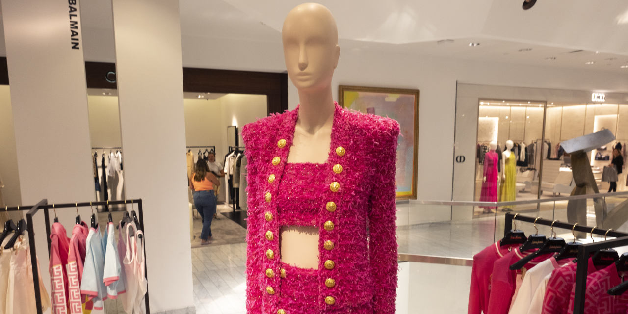 WSJ's tweet card. Retail rivals to combine in a $2.65 billion deal to woo luxury shoppers.