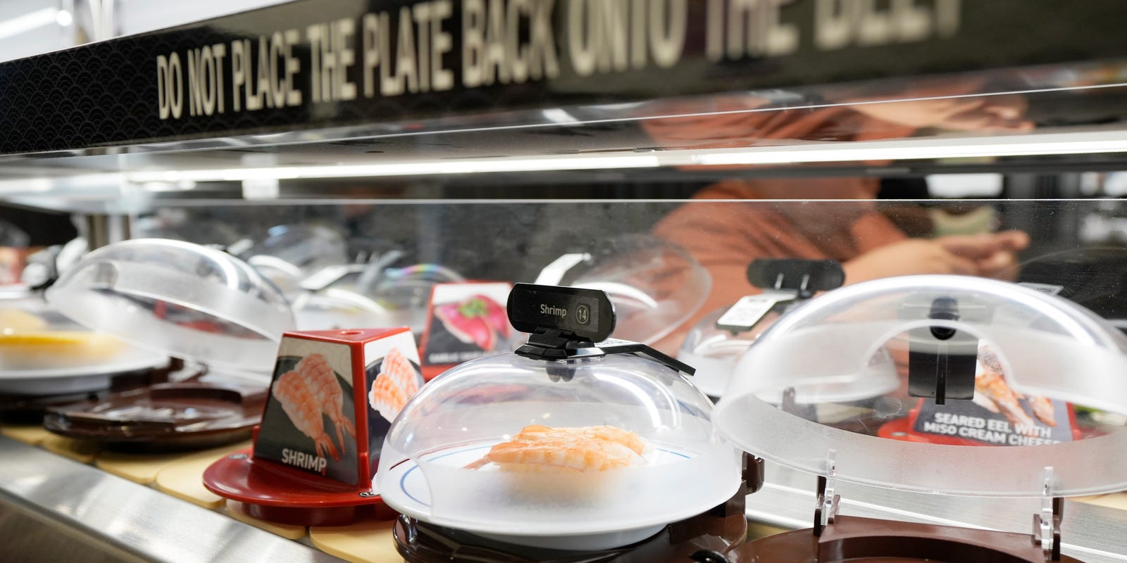 susanmstapleton's tweet card. Kura specializes in small Japanese dishes that drift by the table on a conveyor belt.