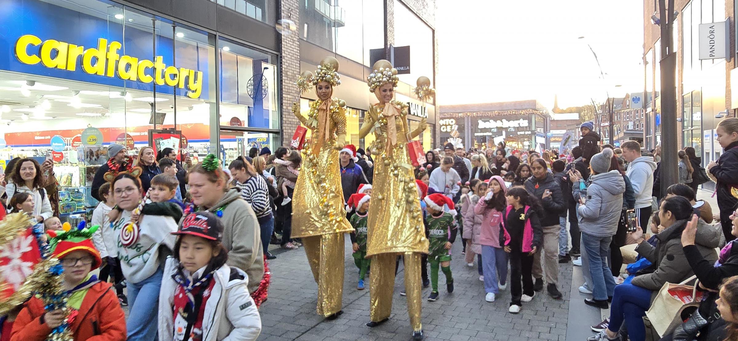 BuryTimes's tweet card. The Rock Shopping Centre's first-ever Christmas Lights Switch-on Parade was held on Saturday in Bury.