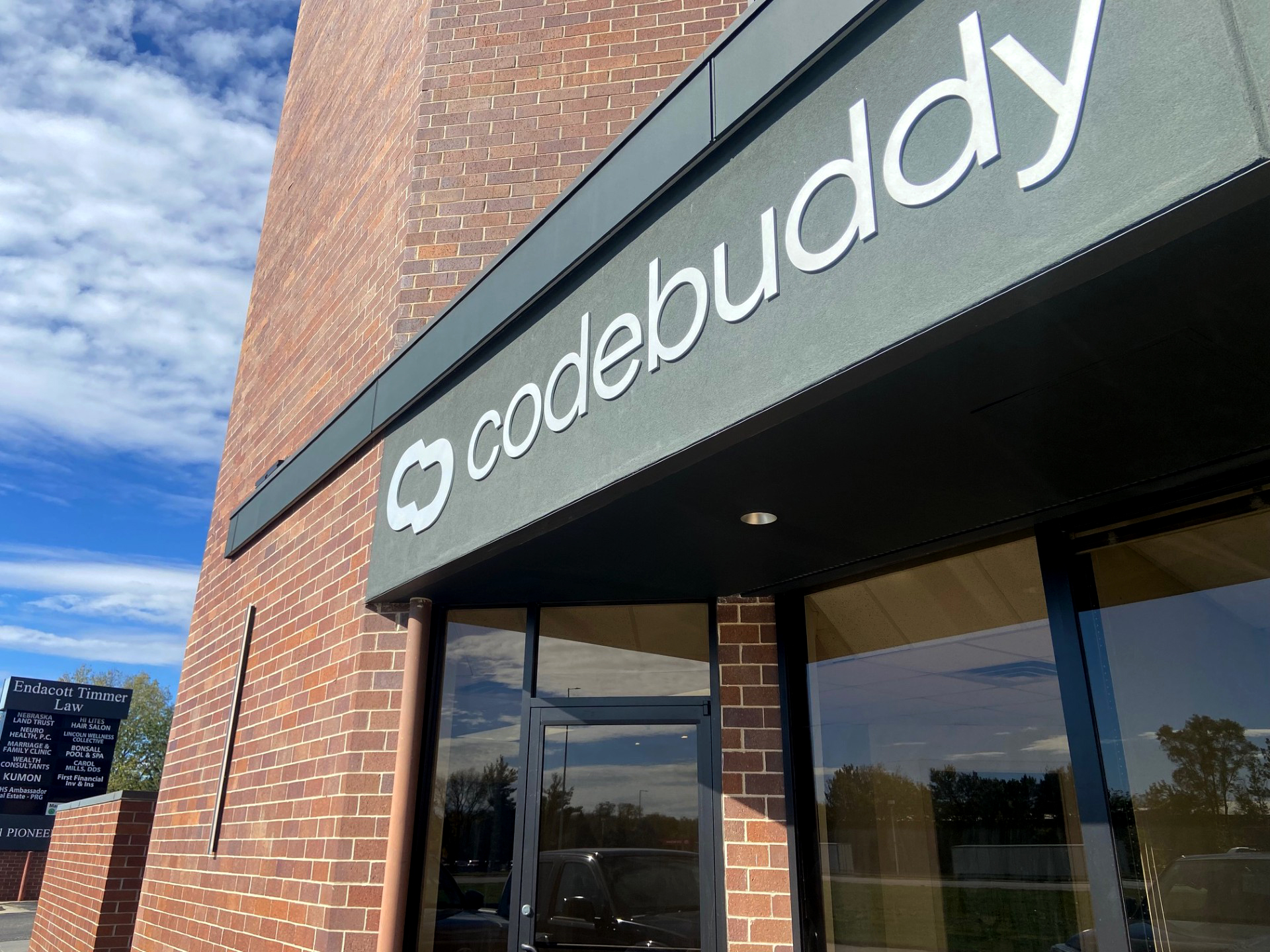 SiliconPrairie's tweet card. The Nebraska-based startup offers AI tools and expert mentors to help non-technical entrepreneurs with software development. The new office marks the first time the CodeBuddy team has had a space of...