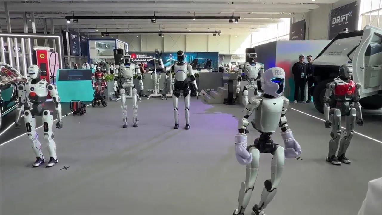 michael407931's tweet card. 💃 Ultimate #robotdance Battle! #engineai PM01 vs #unitree G1 vs...