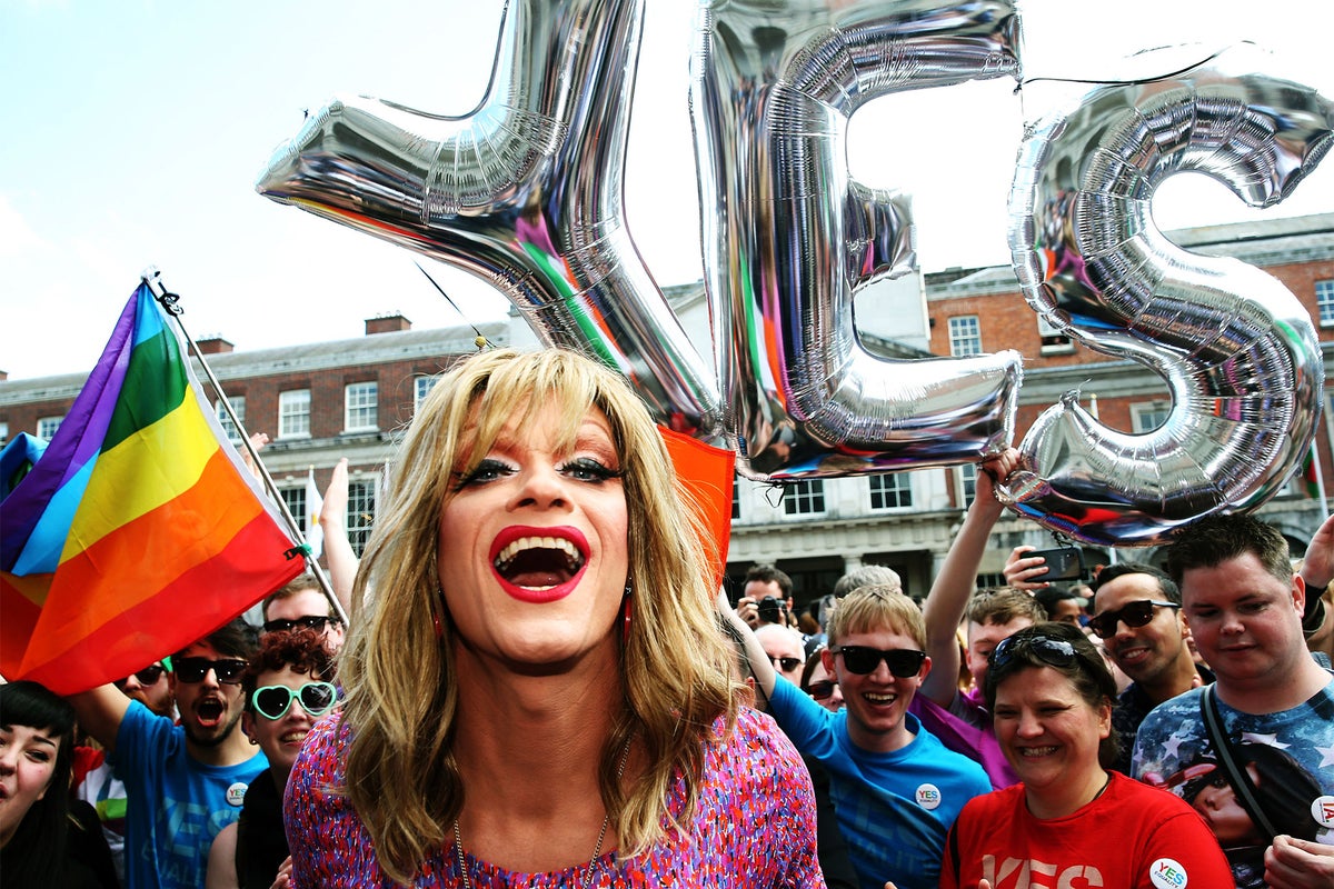 OUTforWorkOrg's tweet card. The term is defined as 'designating a person whose sense of personal identity corresponds to the sex and gender assigned to him or her at birth'