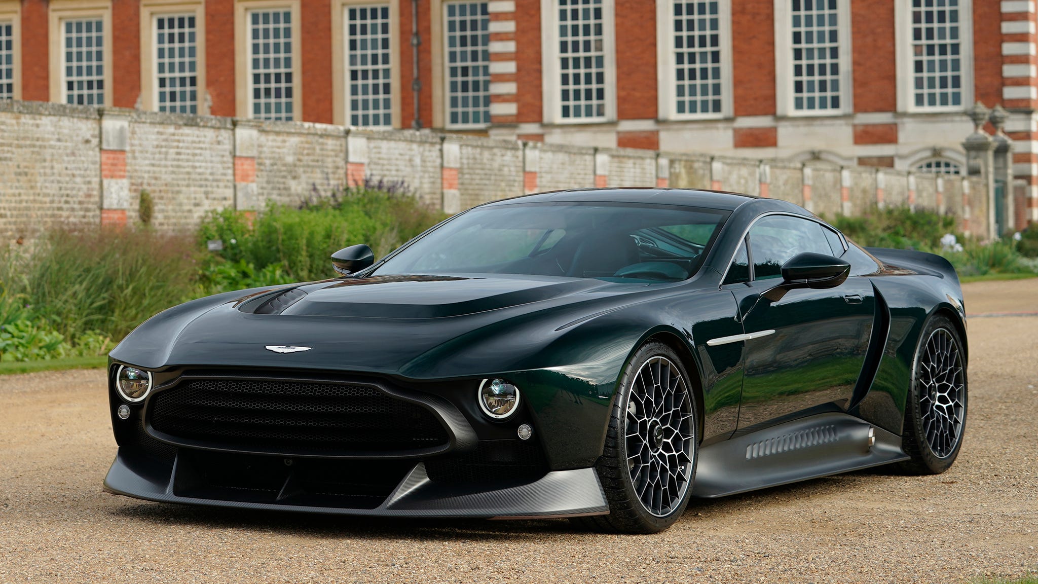 Designeye_q's tweet card. The one-off Victor custom supercar combines Aston Martin's burliest vintage design with racy details and a manual transmission.