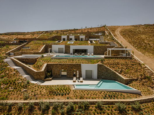 Modelo_io's tweet card. Completed in 2021 in Paros, Greece. Images by George Messaritakis. The project refers to a vacation house which is developed in multiple levels, on a steep slope on the island of Antiparos. Οriented...