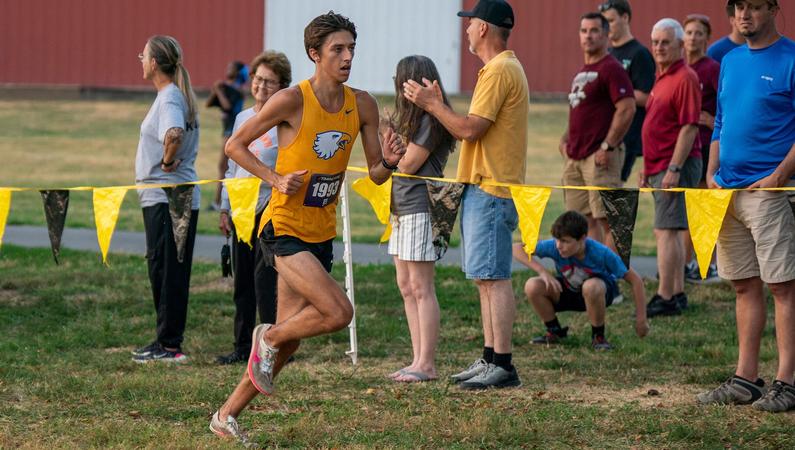 GoMidwayEagles's tweet card. VERSAILLES, Ky. - Carson Milner's dominant season continued with another comfortable win at the Midway Cross Country Invitational Friday, a race in which the Eagle men's team came in third.