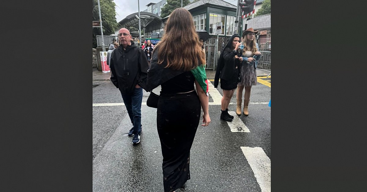 shannonsidenews's tweet card. Isabelle Flanagan, a daughter of Luke 'Ming' Flanagan, says she had the flag draped over her shoulders at the gig.