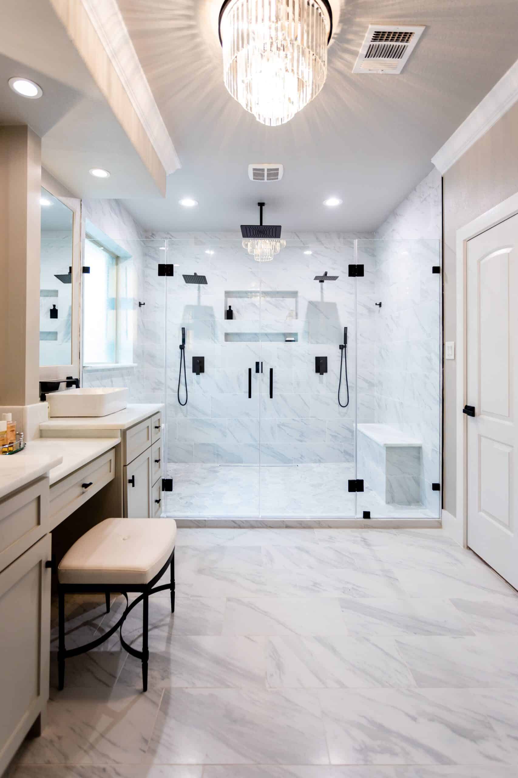 PremiumRemo's tweet card. Luxury begins with materials that exude timeless elegance. The choice of Carrara marble-looking tiles on the extended shower walls and floor brings a touch of