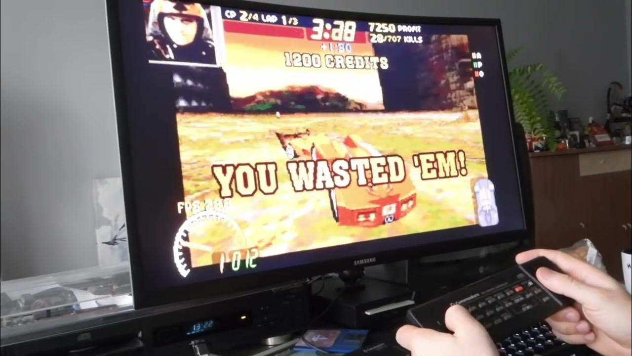 dethrace_labs's tweet card. Carmageddon 68k played on Amiga CDTV with original remote controller