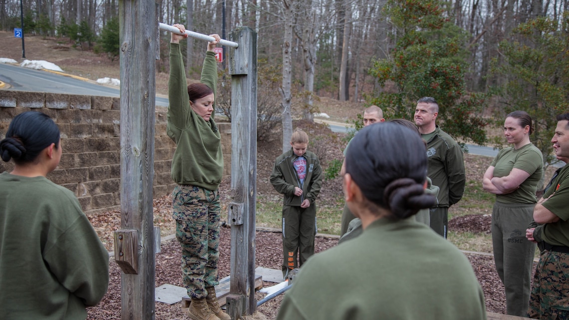 StrictPullUp's tweet card. “I haven’t met someone yet who I haven’t been able to train to do a pull-up.”Major Misty Posey, the plans officer for Manpower Integration, developed a pull-up training program to help all Marines