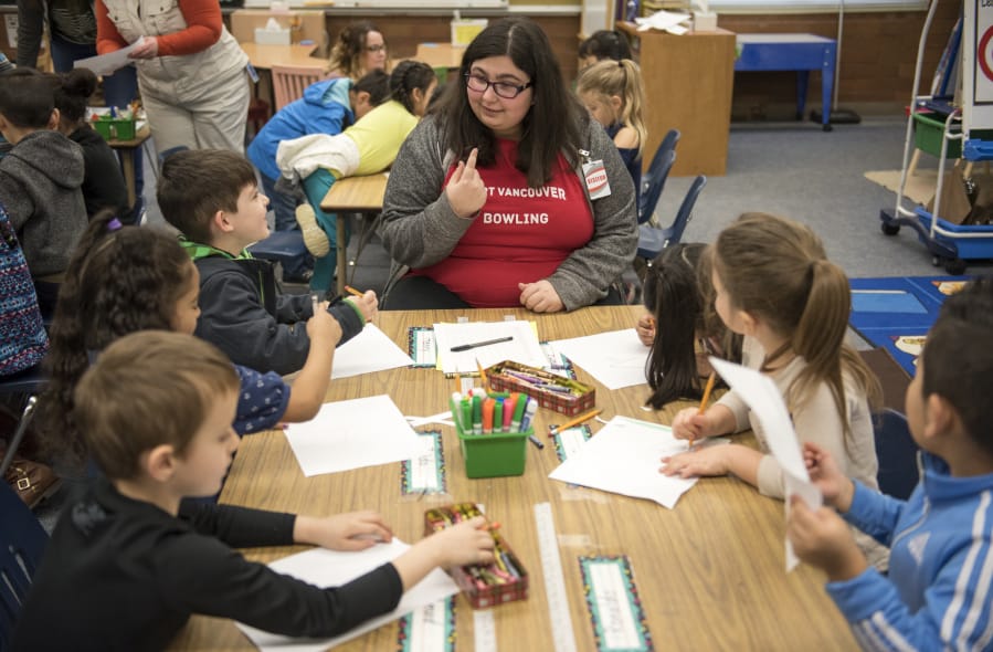 FVHS_CIS's tweet card. Under the watchful eye of Alexandra Mayo, an excited group of kindergartners colored pictures based on one of their classroom books.
