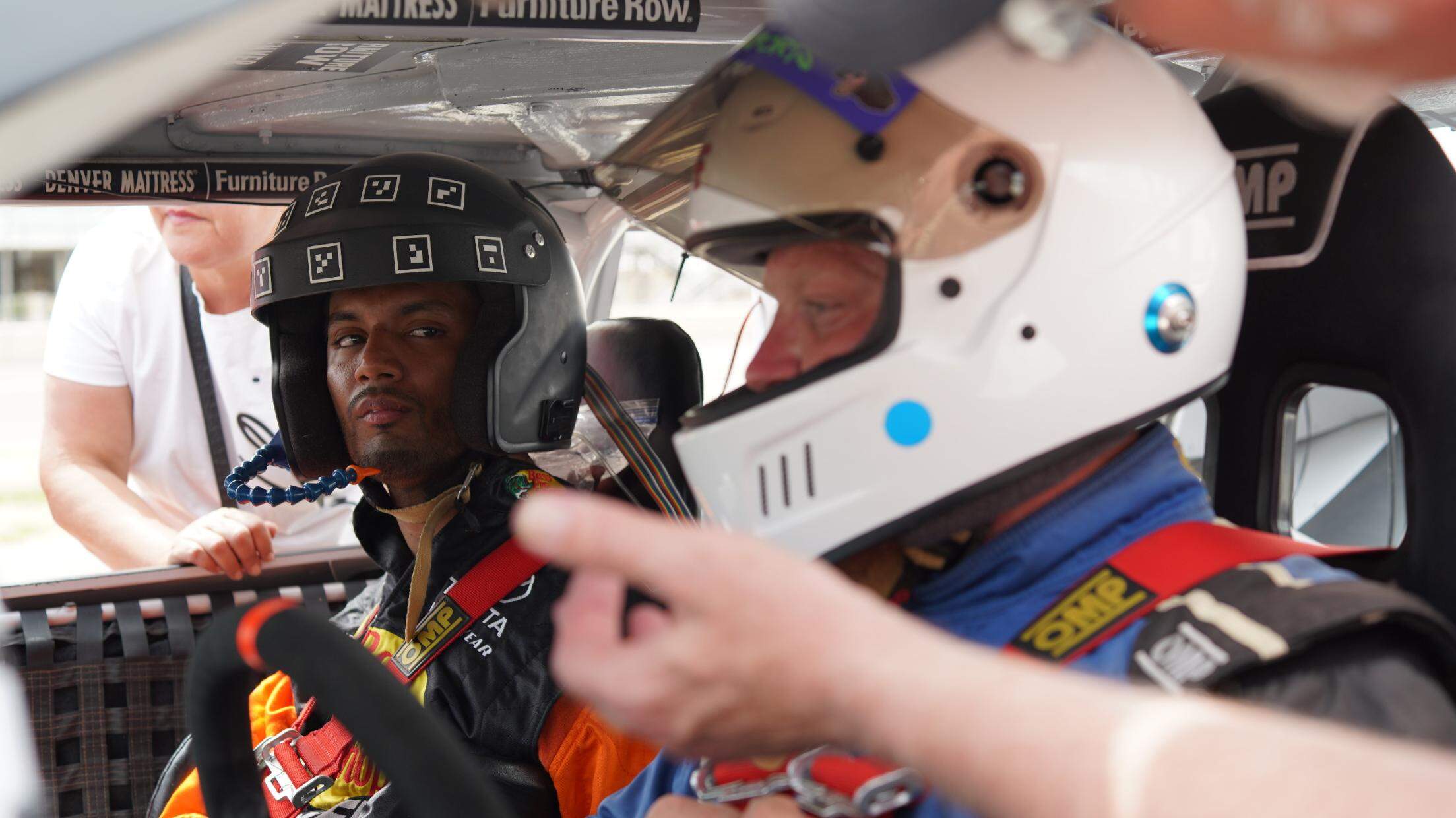 MiamiHerald's tweet card. University of Miami’s Miami Project to Cure Paralysis showcased their new tech that allowed quadriplegic German Aldana Zuniga to drive a race car with his mind.