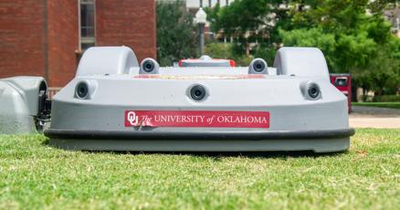 CanadianMike101's tweet card. OU implemented two mowing robots across the Norman campus early July in an effort to enhance efficiency and contribute to the department’s sustainability goal.